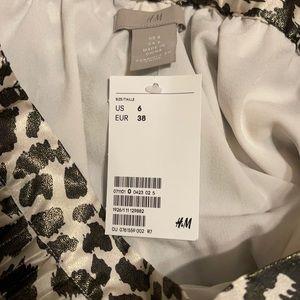 NWT pleated animal print skirt